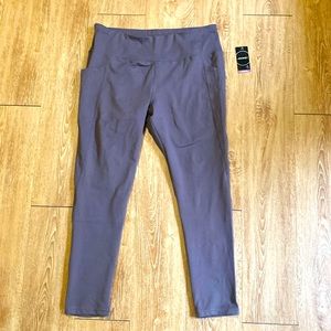 New with tags athletic leggings. Jockey size L. Plum color